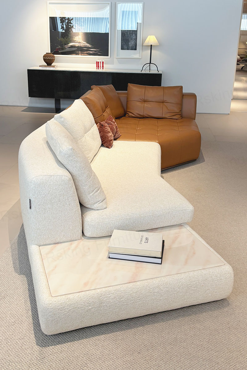Side view of the Rsking RSK2518 showing its extended upholstered platform, pale marble surface and shaped metal base
