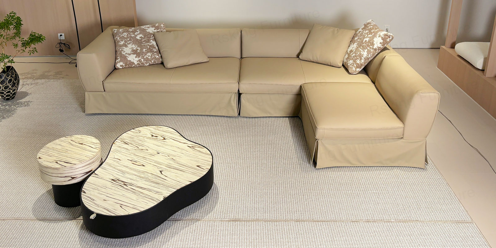 Rsking RSK2606 beige leather sectional sofa shown in an L-shaped showroom arrangement