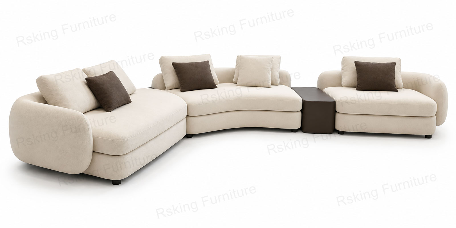 Angled view of the cream fabric sectional showing its inward-curving middle section and rounded outer arm